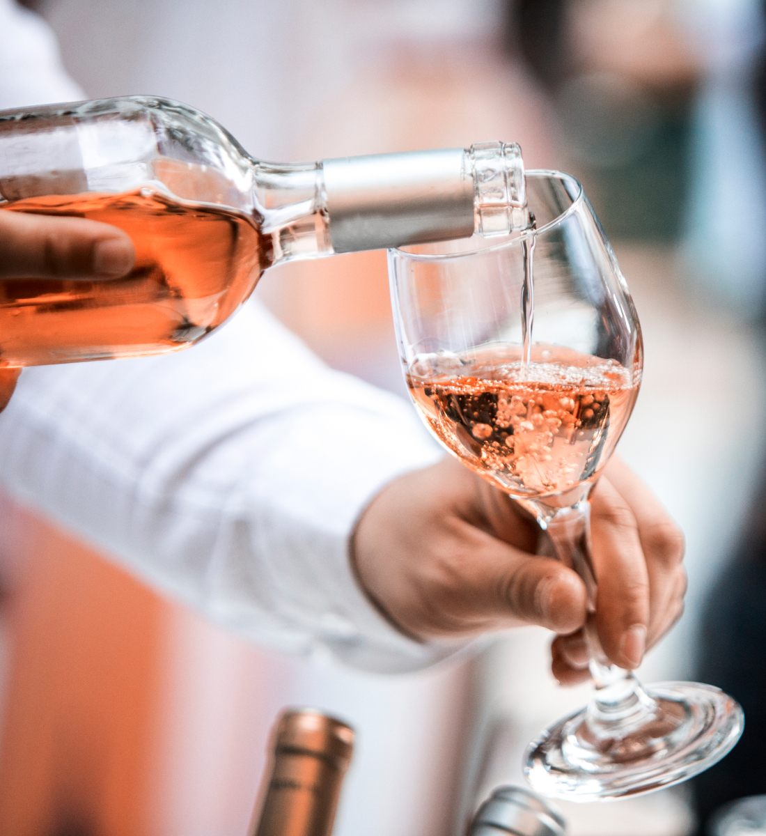 A close up photo of rose being poured